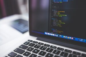 coding on laptop screen